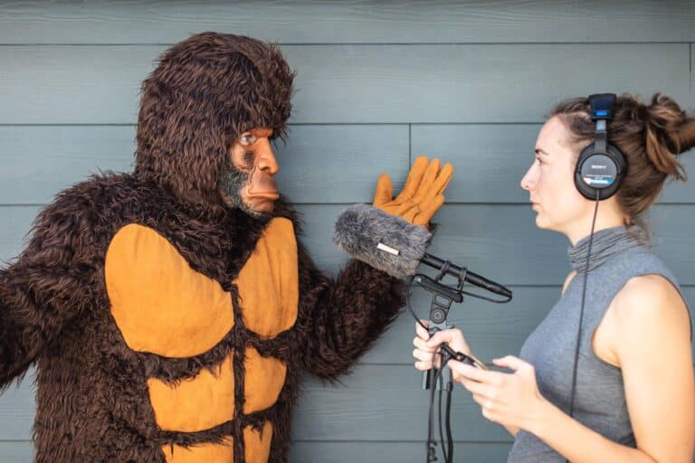 woman interviewing for a podcast