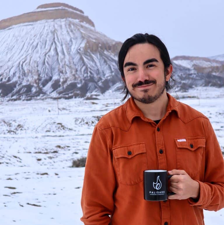 Elisha Espinoza is the founder of Palisade Coffee Company